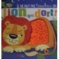 IL NE FAUT PAS TOUCHER... - UN LION QUI DORT